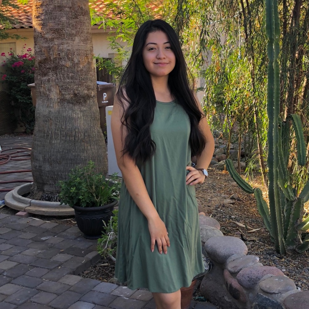 Green spaghetti strap flowy dress.